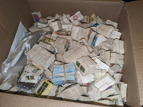 Bundles of US & Canadian Postage Stamps