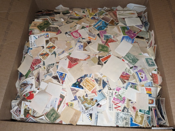 Worldwide bulk loose (95% off paper) postage stamps